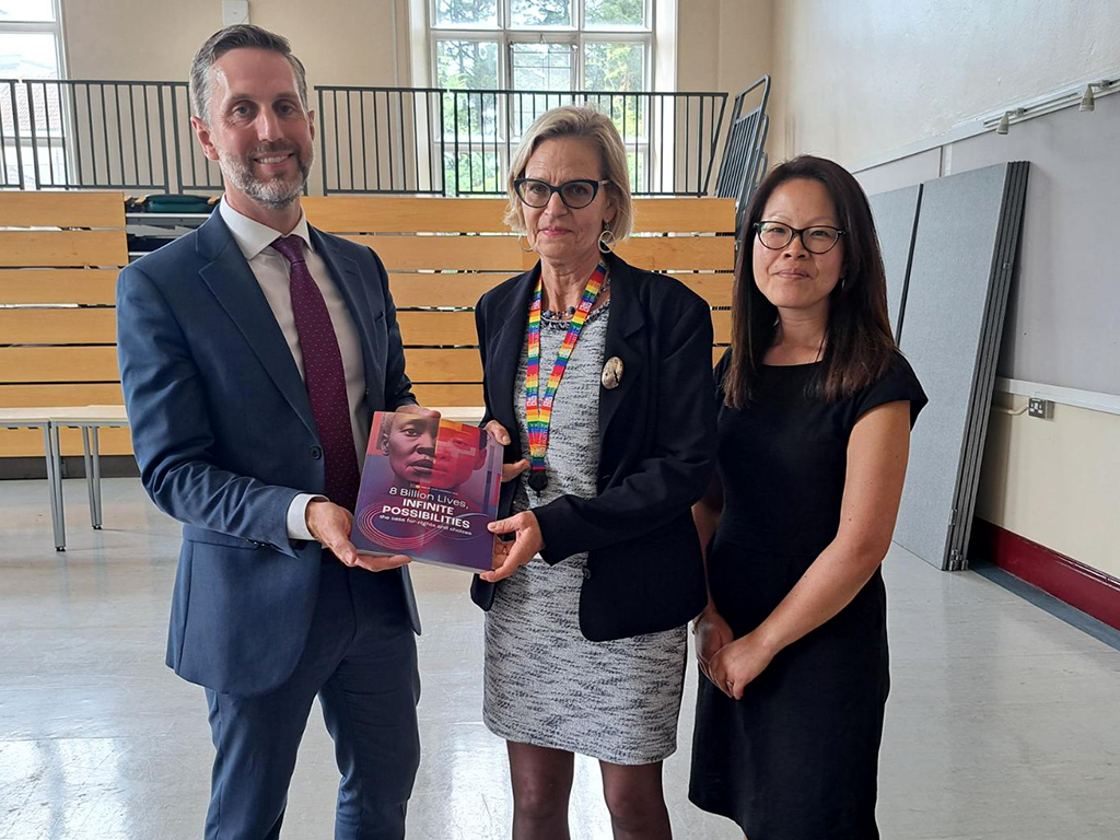 UNFPA London Chief Matt Jackson, Professor Agnes Nairn and Dr Susan Jim with UNFA report: Eight billion lives, infinite possibilities, the case for rights and choices