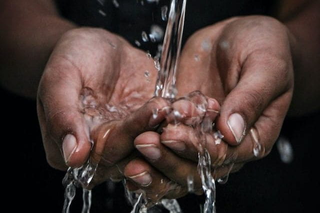 Water pouring on hands